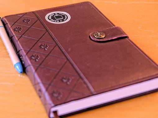 Brown leather-bound note book