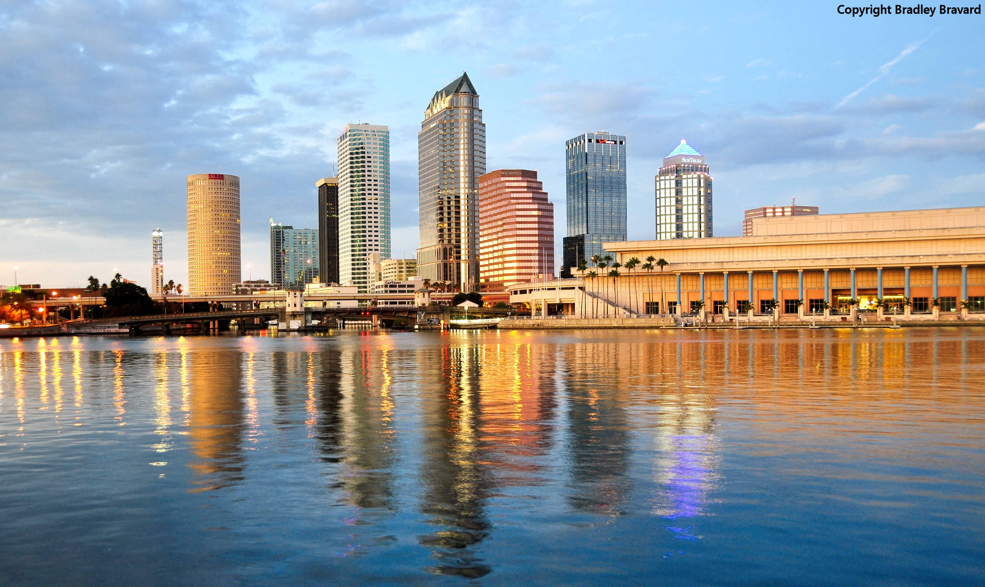Color photo of Tampa, Florida, with skyline reflected in the Hillsborough River