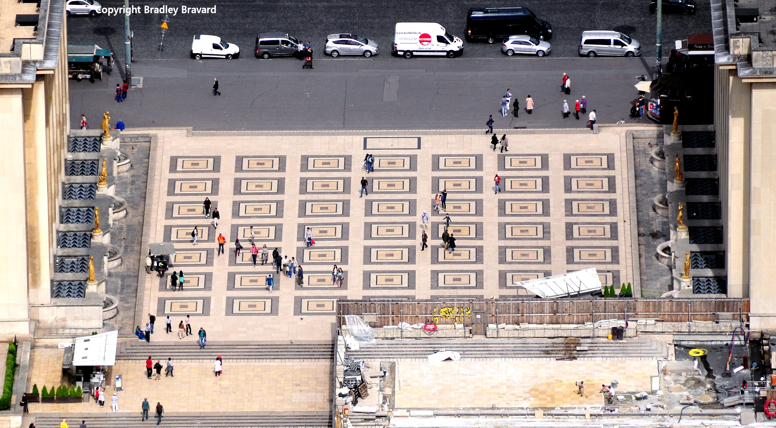 People walking along the Palais de Chaillot in Paris, photographed from the Eiffel Tower