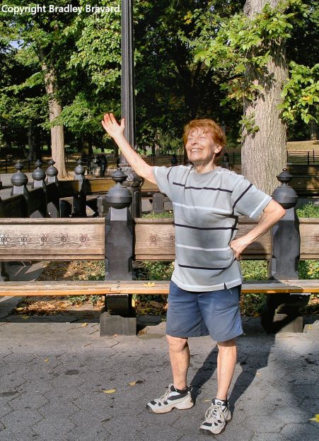 Photo of woman standing in dramatic pose in Central Park in New York City