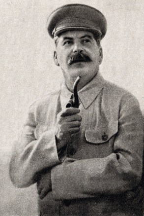 Black and white photo of Joseph Stalin holding a pipe