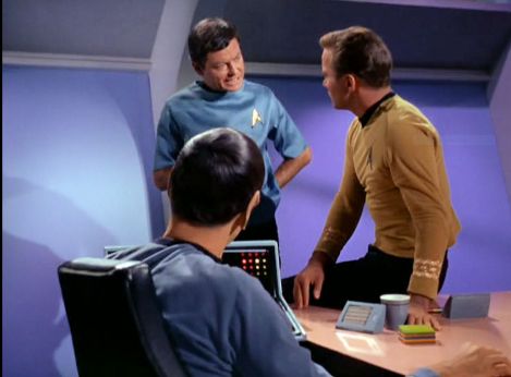 Image from Star Trek episode Charlie X showing Spock, McCoy, and Kirk in Enterprise conference room