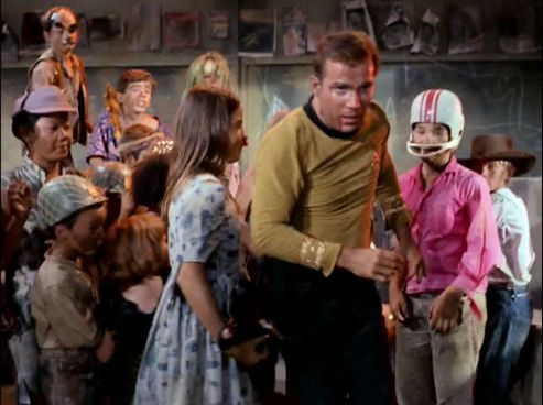 Image from Star Trek episode Miri showing group of kids attacking Kirk