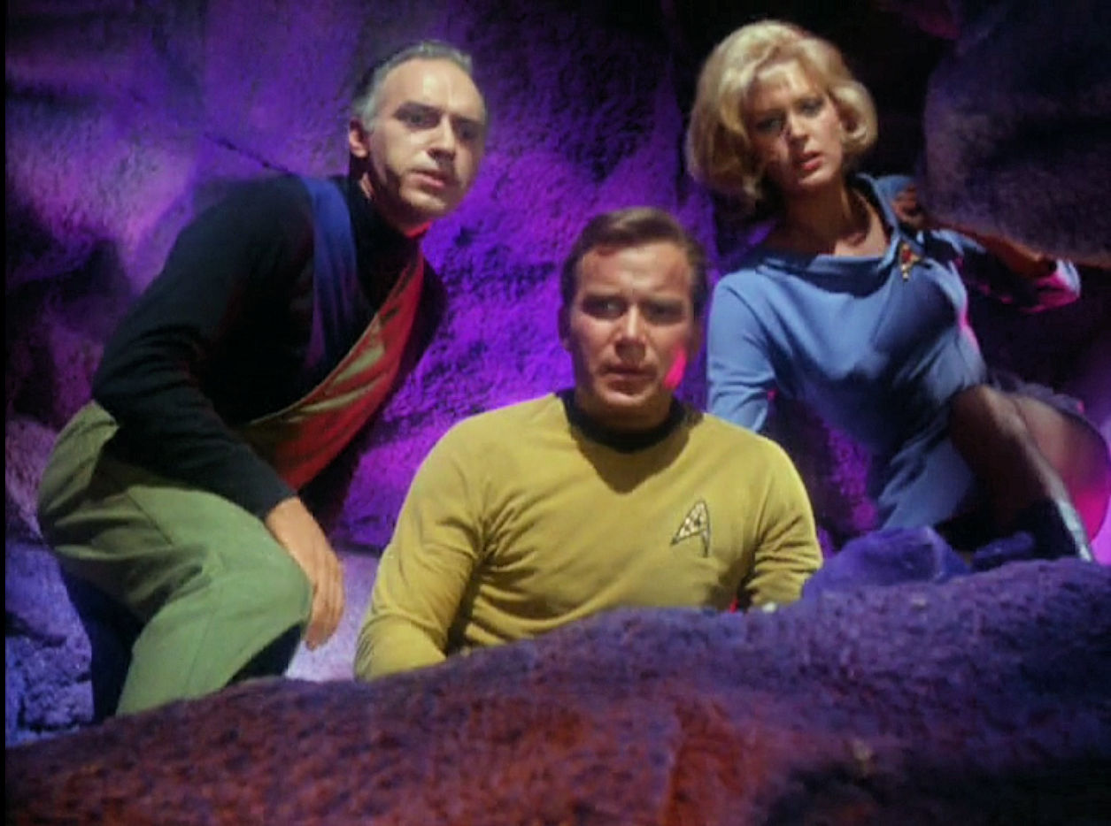 Image from Star Trek episode What Are Little Girls Made Of showing Brown, Kirk, and Chapel in cave
