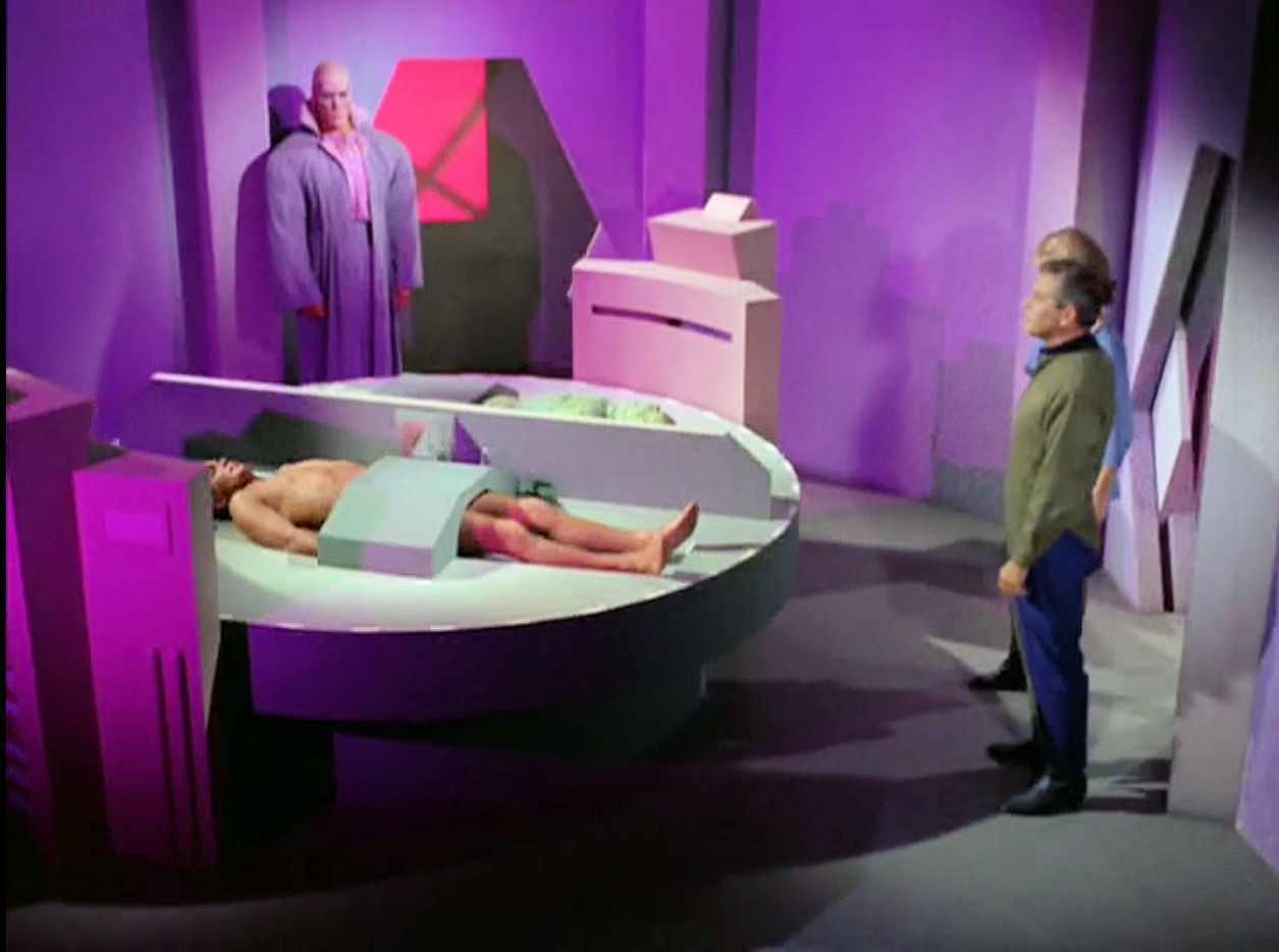 Image from Star Trek episode What Are Little Girls Made Of showing Ruk, Kirk, Korby, and Chapel