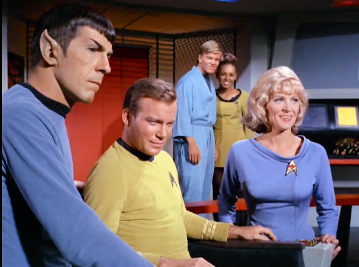Image from Star Trek episode What Are Little Girls Made Of showing Spock, Kirk, 2 unidentified crew members, and Chapel