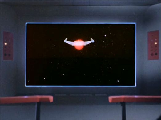 Image from Star Trek episode Balance of Terror showing Romulan Bird-of-Prey firing weapon at Enterprise